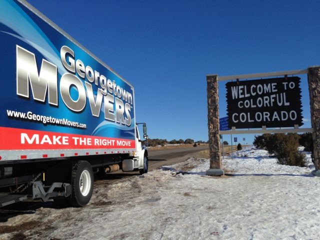Georgetown Moving and Storage truck parked at the Colorado border.