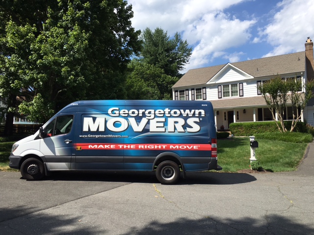 Georgetown Moving van parked at a customer's home.