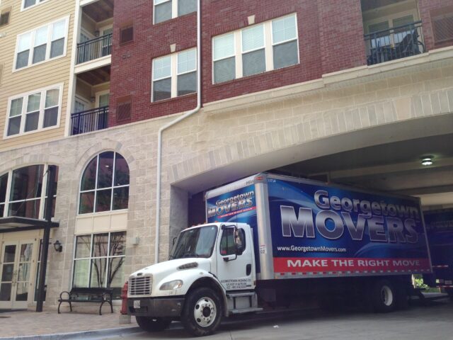 Moving truck under the building in Clarendon, VA